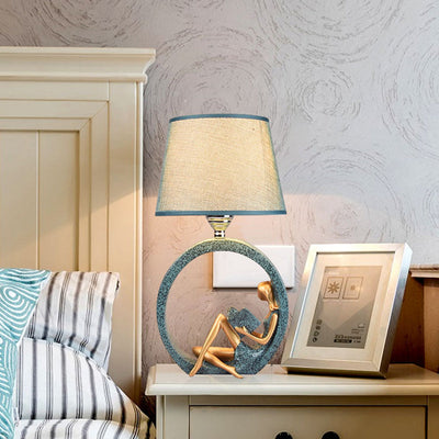 Avelyn | Yndefuld Leserharz Tischlampe mit blauer Stoffschirm