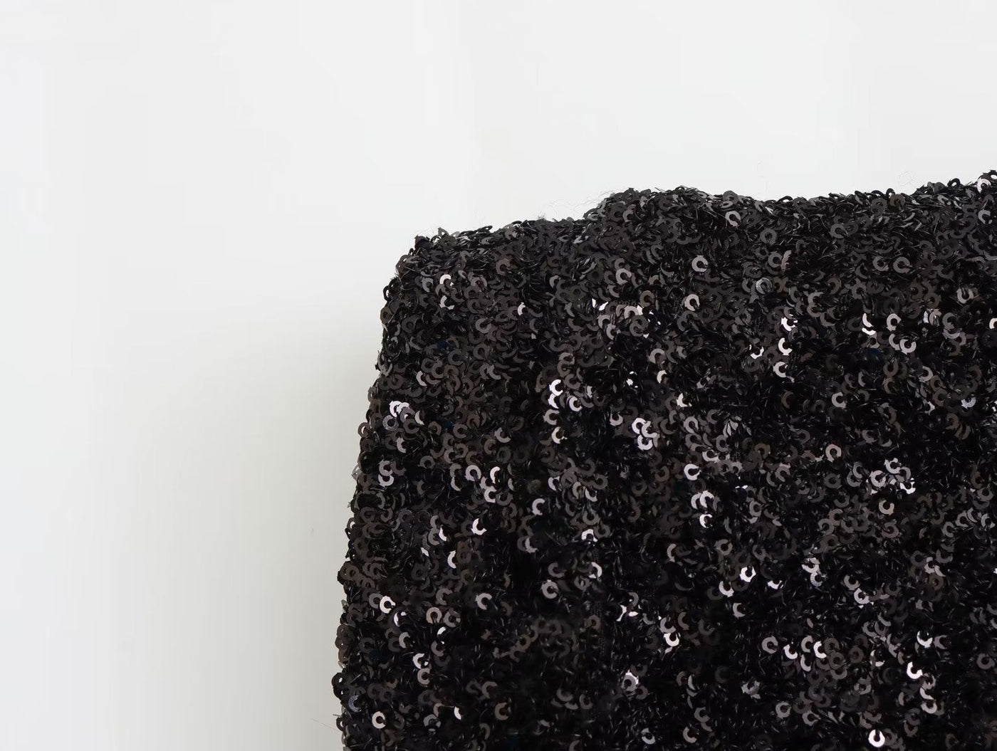 Christine – Ärmelloses Mini-Kleid mit Perlen und gepolsterten Schultern