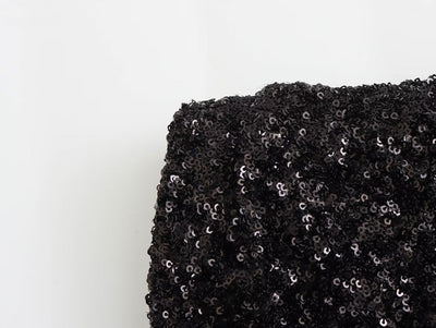 Christine – Ärmelloses Mini-Kleid mit Perlen und gepolsterten Schultern