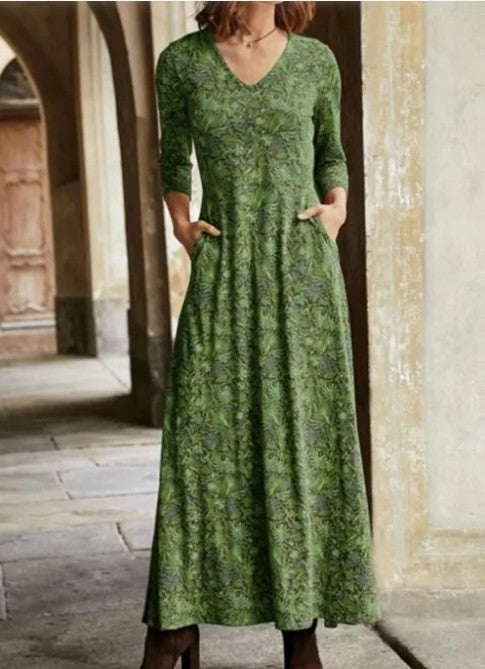 Joy – Bedrucktes langes V-Ausschnitt-Kleid mit Taschen