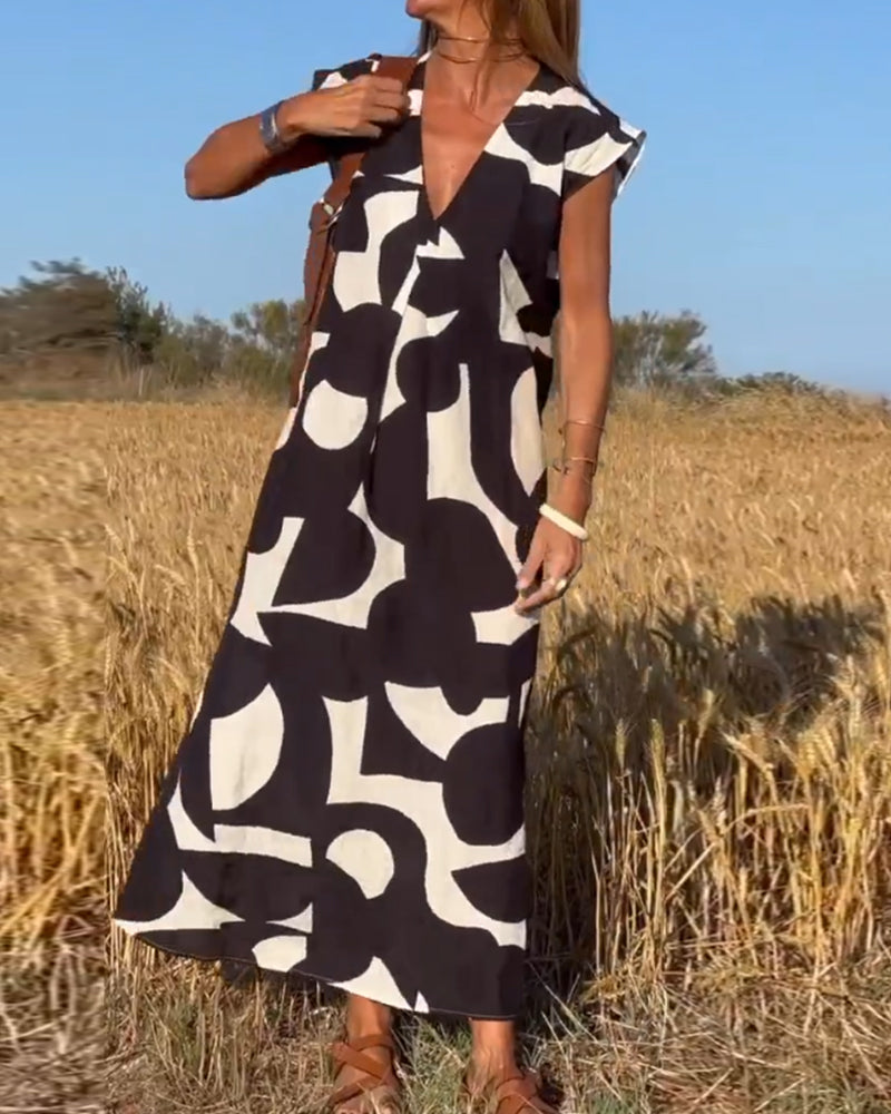 NAOMI | Gestreiftes Maxikleid mit V-Ausschnitt und A-Linien-Schnitt für einen Urlaubslook