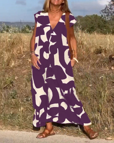 NAOMI | Gestreiftes Maxikleid mit V-Ausschnitt und A-Linien-Schnitt für einen Urlaubslook