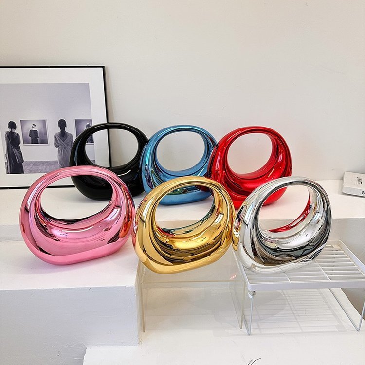 Janet – Zylinderförmige Abendtasche aus Acryl