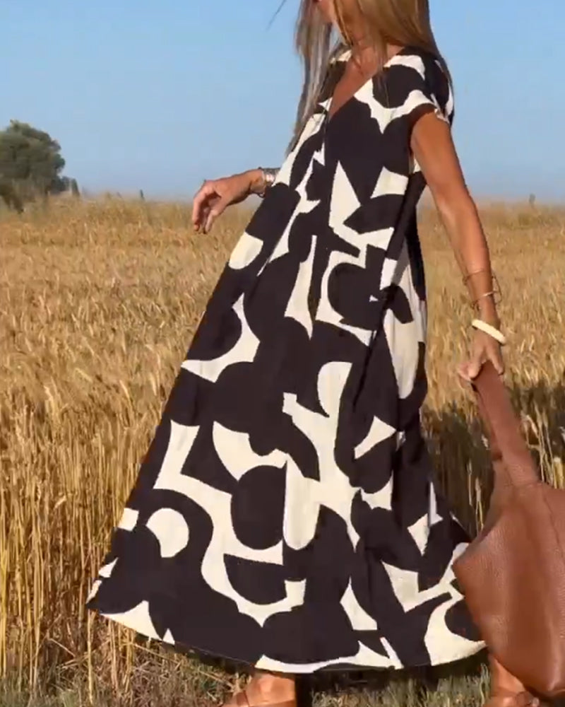 NAOMI | Gestreiftes Maxikleid mit V-Ausschnitt und A-Linien-Schnitt für einen Urlaubslook