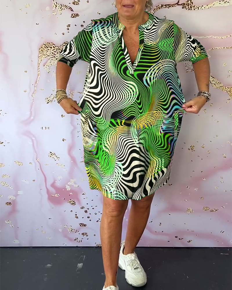 Yara™ | Elegantes V-Ausschnitt Kleid mit Bunter Note