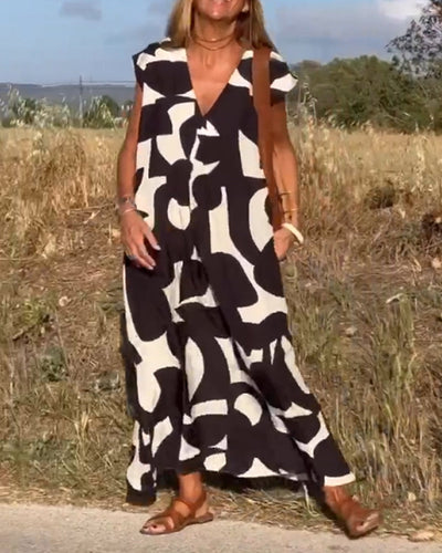 NAOMI | Gestreiftes Maxikleid mit V-Ausschnitt und A-Linien-Schnitt für einen Urlaubslook