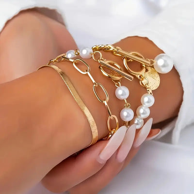 Elegantes 4-teiliges Armbandset in Gold – Schlange, Perlen & Glieder