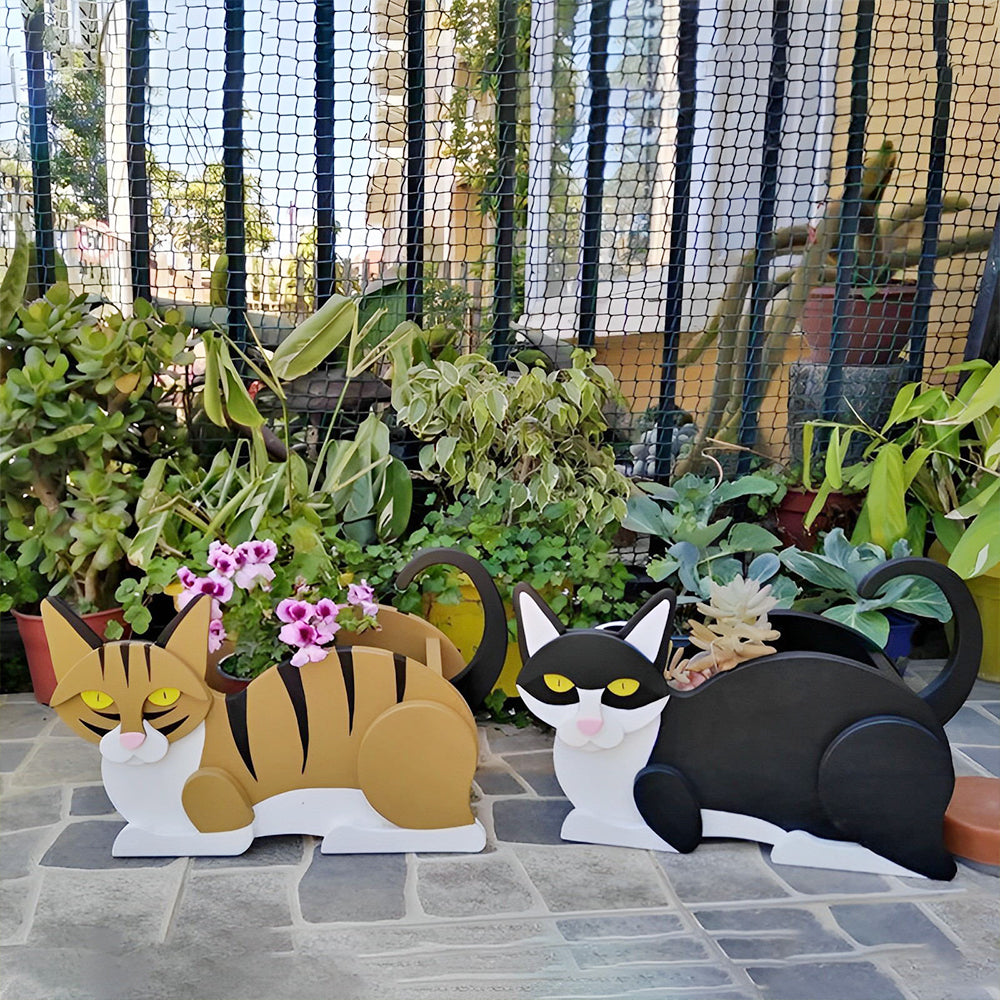 Blumentopf mit orange-weißer Katze