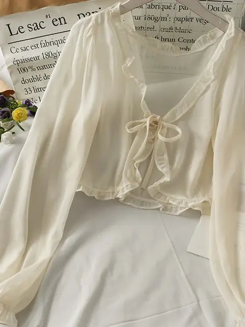 Luciana - Transluzente Bluse mit Schleife