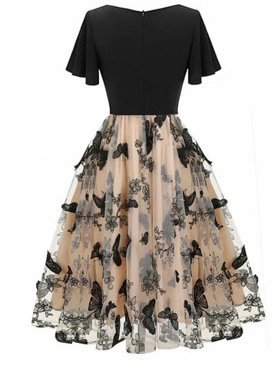 Stilvolle Midikleid aus Mesh mit Stickerei & Volantärmeln – Maila