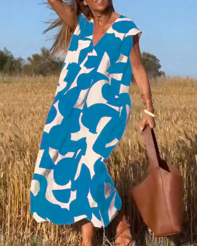 NAOMI | Gestreiftes Maxikleid mit V-Ausschnitt und A-Linien-Schnitt für einen Urlaubslook