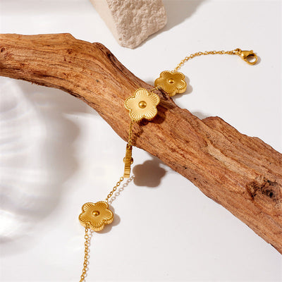 Katie – Goldbeschichtetes Blumenarmband aus Ketten