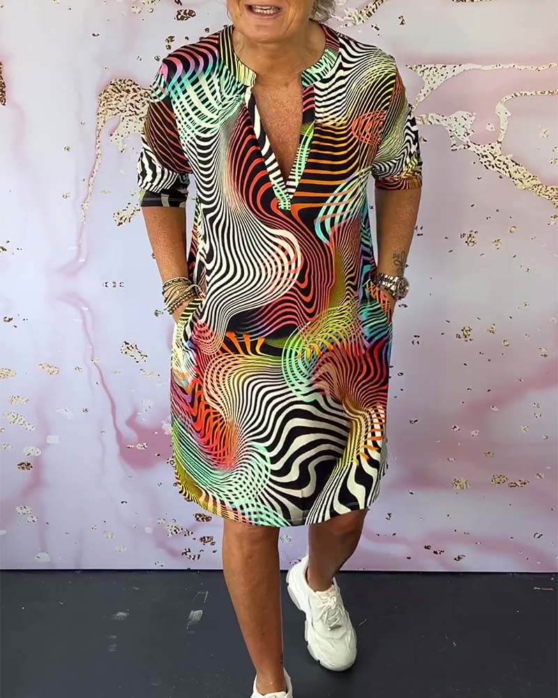 Yara™ | Elegantes V-Ausschnitt Kleid mit Bunter Note