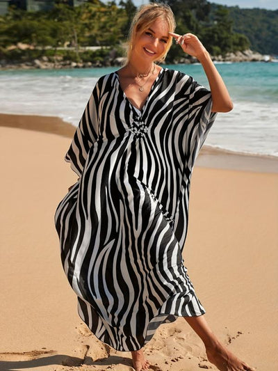 Strandkleid mit zebra-print und v-ausschnitt
